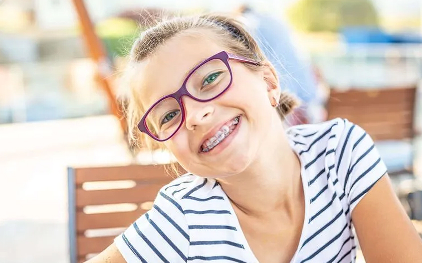 A child with braces.